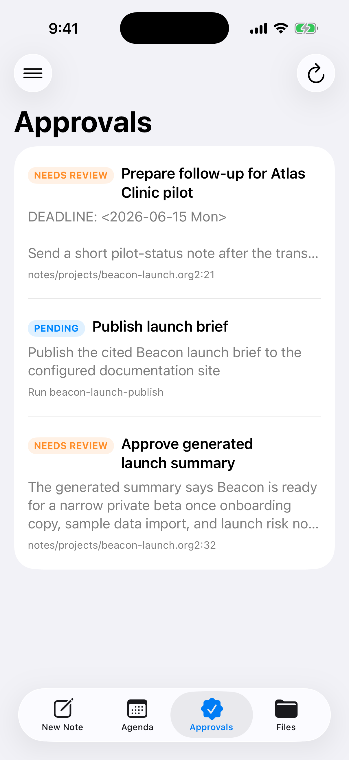 OpenOrg approvals list on iPhone showing review-required corpus items